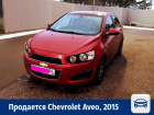 Двухлетняя красная Chevrolet Aveo продается в Воронеже 