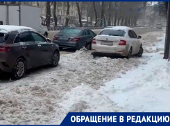 Водители откапывают машины на платных парковках в Воронеже
