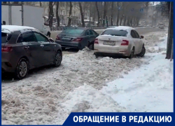 Водители откапывают машины на платных парковках в Воронеже